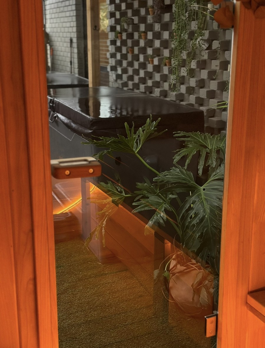 Looking out from the barrel sauna into the Garden courtyard